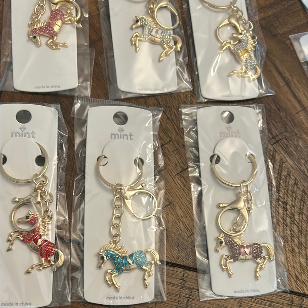 Gold Horse Keychain Set with Red, Blue, and Pink Accents Prefer your color